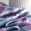 Blue and purple tropical print silk scarf detail