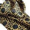 Detail of black and gold scarf for men and women